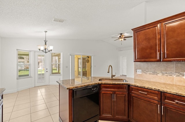1914 Ellery Ln, Kissimmee, FL 34746 - kitchen with black dishwasher, a sink, a peninsula, a chandelier, and backsplash