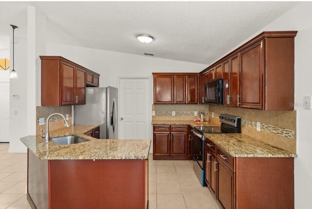 1914 Ellery Ln, Kissimmee, FL 34746 - kitchen featuring stainless steel appliances, light tile patterned floors, a sink, a peninsula, and a textured ceiling