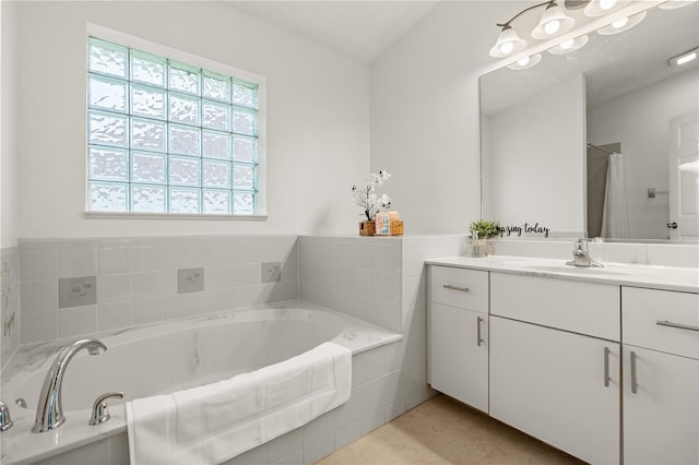 1914 Ellery Ln, Kissimmee, FL 34746 - full bath featuring vanity, a bath, and tile patterned floors