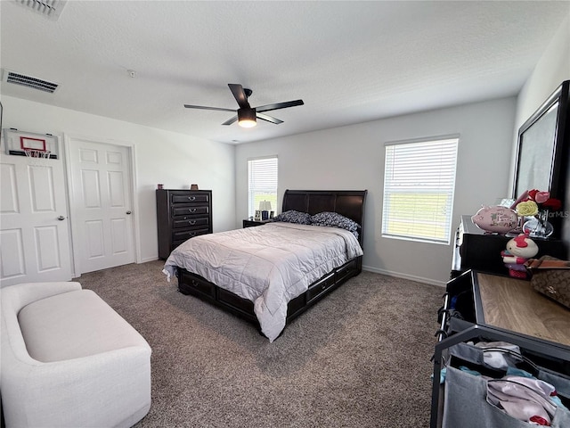 2086 Crape Jasmine Ln, Orlando, FL 32824 - bedroom with carpet, ceiling fan, and baseboards