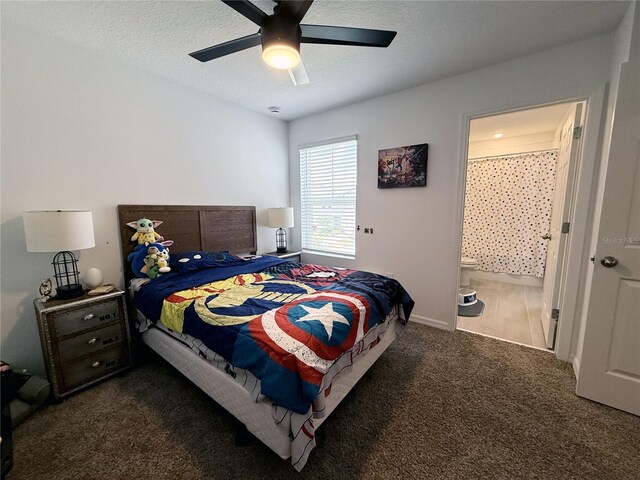 2086 Crape Jasmine Ln, Orlando, FL 32824 - bedroom with carpet flooring, a ceiling fan, ensuite bathroom, and a textured ceiling