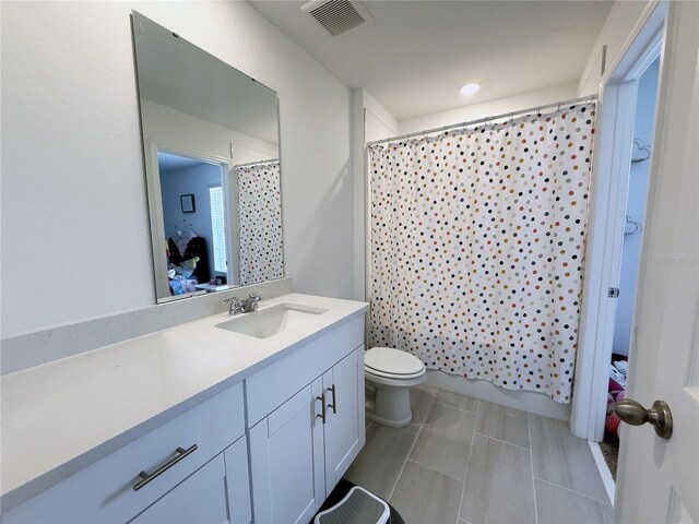 2086 Crape Jasmine Ln, Orlando, FL 32824 - bathroom featuring toilet and vanity