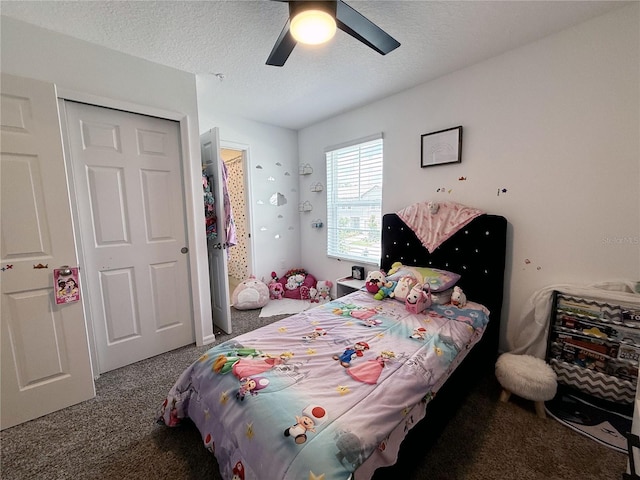 2086 Crape Jasmine Ln, Orlando, FL 32824 - bedroom featuring carpet, ceiling fan, a textured ceiling, and a closet