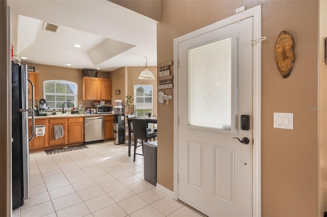 2912 Lazlo Ln, Orlando, FL 32837 - entryway with light tile patterned floors, recessed lighting, and baseboards