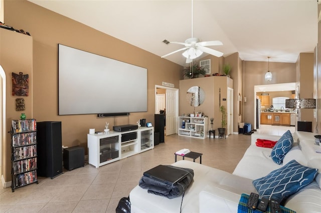 2912 Lazlo Ln, Orlando, FL 32837 - cinema featuring high vaulted ceiling, ceiling fan, light tile patterned flooring, and a sink