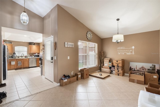 2912 Lazlo Ln, Orlando, FL 32837 - entrance foyer featuring high vaulted ceiling, light tile patterned floors, and baseboards