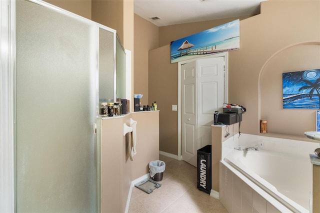 2912 Lazlo Ln, Orlando, FL 32837 - full bath with a stall shower, tile patterned floors, and a bath