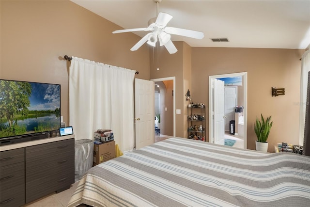 2912 Lazlo Ln, Orlando, FL 32837 - bedroom with vaulted ceiling, ceiling fan, and light tile patterned floors