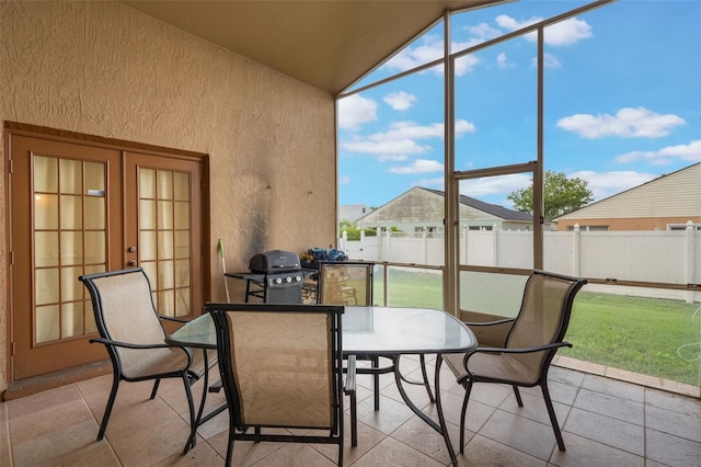 2912 Lazlo Ln, Orlando, FL 32837 - sunroom featuring vaulted ceiling and french doors
