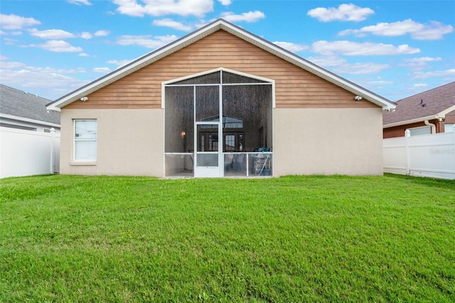 2912 Lazlo Ln, Orlando, FL 32837 - back of house featuring stucco siding and a sunroom