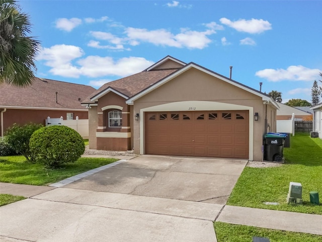 2912 Lazlo Ln, Orlando, FL 32837 - ranch-style home with stucco siding, a garage, and concrete driveway