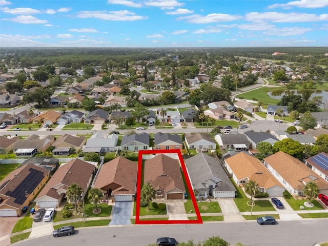 2912 Lazlo Ln, Orlando, FL 32837 - aerial view of residential area featuring property boundaries highlighted and a large body of water