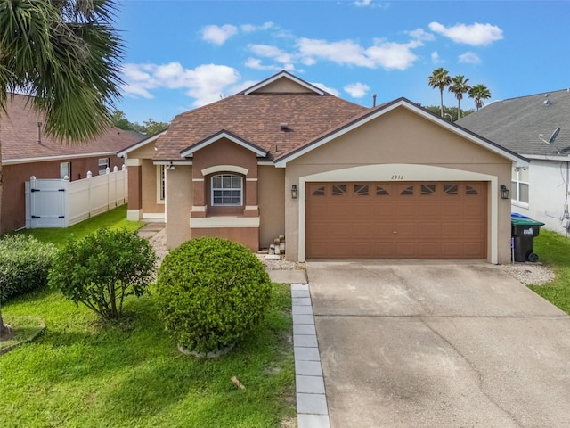 2912 Lazlo Ln, Orlando, FL 32837 - single story home with stucco siding, driveway, a shingled roof, and an attached garage