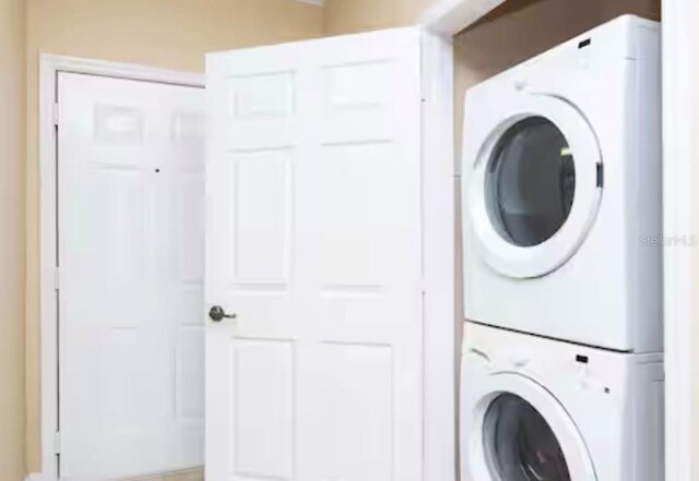 1375 Tuscana Ln Unit 1405, Davenport, FL 33896 - laundry room with stacked washer / drying machine