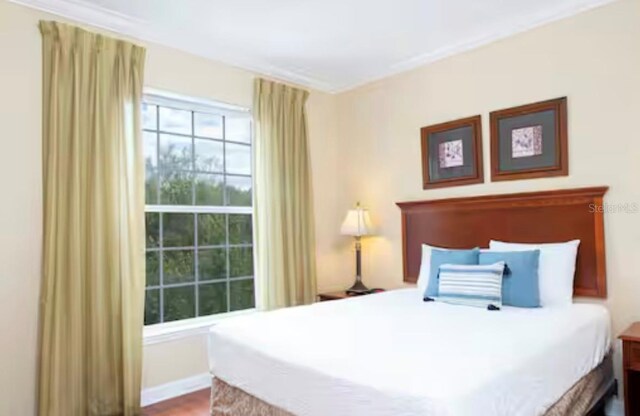 1375 Tuscana Ln Unit 1405, Davenport, FL 33896 - bedroom featuring wood finished floors