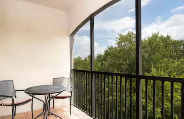 1375 Tuscana Ln Unit 1405, Davenport, FL 33896 - balcony featuring outdoor dining space
