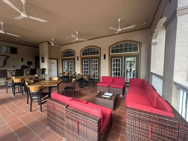 1375 Tuscana Ln Unit 1405, Davenport, FL 33896 - view of patio / terrace with french doors, ceiling fan, outdoor lounge area, and outdoor dining area