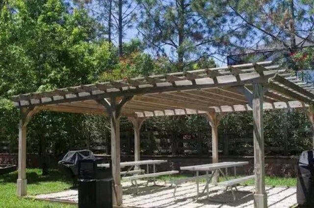 1375 Tuscana Ln Unit 1405, Davenport, FL 33896 - surrounding community featuring a pergola