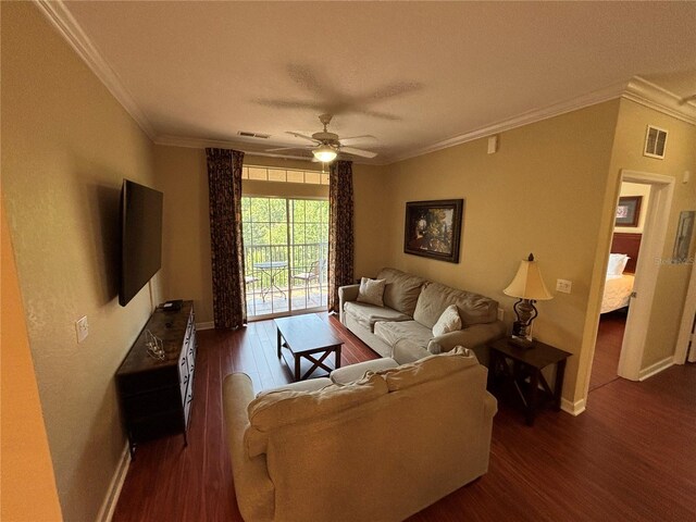1375 Tuscana Ln Unit 1405, Davenport, FL 33896 - living room with dark wood-style floors, ornamental molding, baseboards, and a ceiling fan