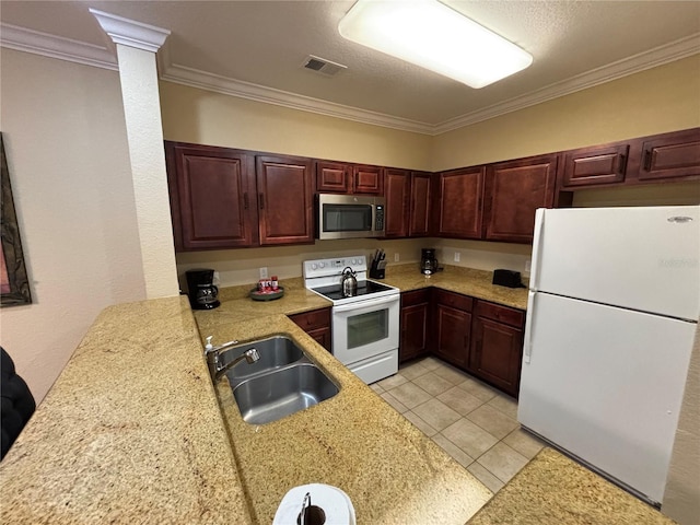 1375 Tuscana Ln Unit 1405, Davenport, FL 33896 - kitchen featuring white appliances, a sink, light countertops, ornamental molding, and light tile patterned floors