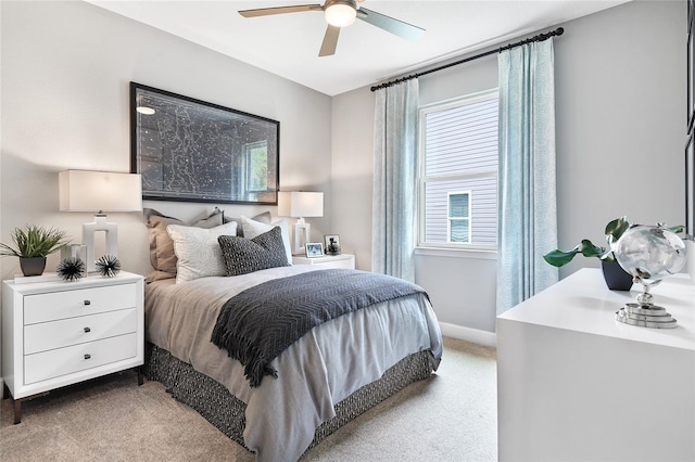 9211 Players Dr, Weeki Wachee, FL 34613 - bedroom with carpet flooring, baseboards, and ceiling fan