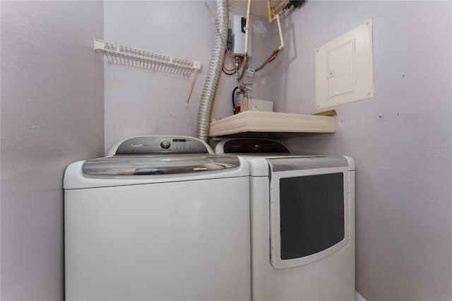437 Fountainhead Cir Unit 283, Kissimmee, FL 34741 - laundry room featuring independent washer and dryer and electric panel