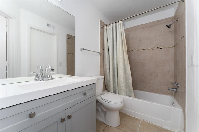 437 Fountainhead Cir Unit 283, Kissimmee, FL 34741 - bathroom with tile patterned floors, shower / tub combo, toilet, and vanity