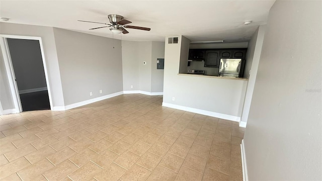 4728 Walden Cir Unit 32, Orlando, FL 32811 - unfurnished living room with ceiling fan and baseboards