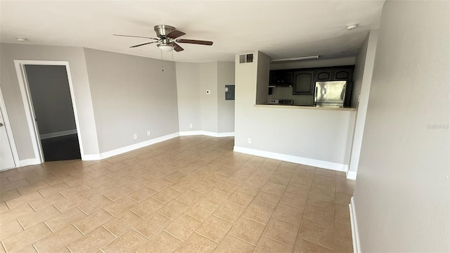 4728 Walden Cir Unit 32, Orlando, FL 32811 - unfurnished living room featuring ceiling fan and baseboards