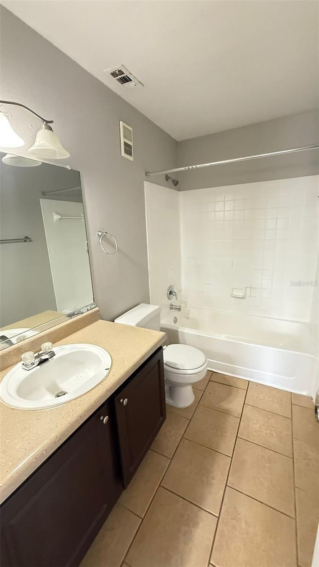 4728 Walden Cir Unit 32, Orlando, FL 32811 - bathroom featuring vanity, tile patterned flooring, and  shower combination