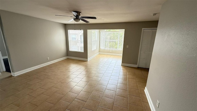 4728 Walden Cir Unit 32, Orlando, FL 32811 - unfurnished room featuring ceiling fan and baseboards