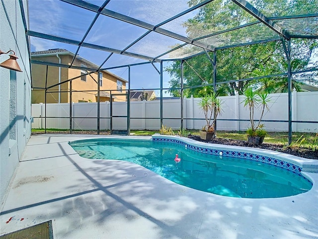 1851 Hammock Moss Dr, Orlando, FL 32820 - view of swimming pool featuring a patio area and glass enclosure