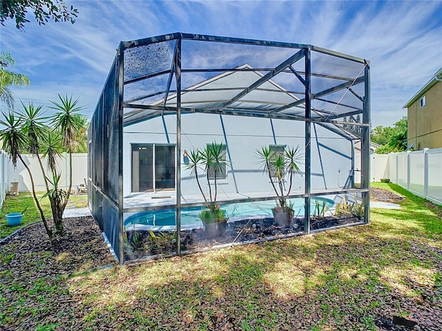 1851 Hammock Moss Dr, Orlando, FL 32820 - back of property with glass enclosure