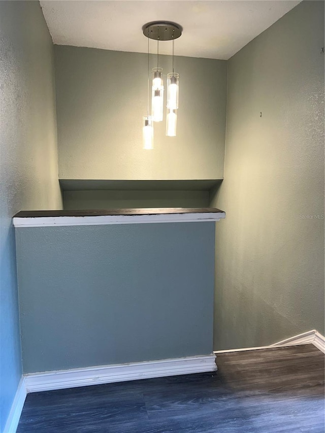 5826 Peregrine Ave Unit F01, Orlando, FL 32819 - unfurnished dining area featuring wood finished floors and baseboards
