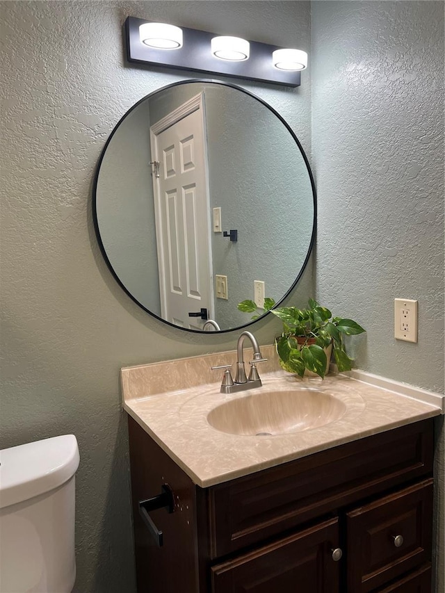 5826 Peregrine Ave Unit F01, Orlando, FL 32819 - half bath featuring vanity and toilet