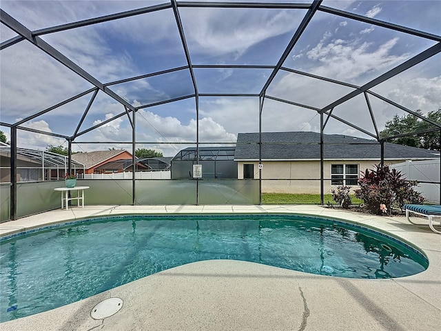 1364 Rebecca Dr, Haines City, FL 33844 - swimming pool with a patio and glass enclosure