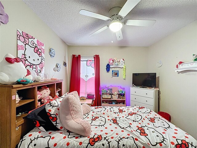 1364 Rebecca Dr, Haines City, FL 33844 - bedroom with a textured ceiling and a ceiling fan