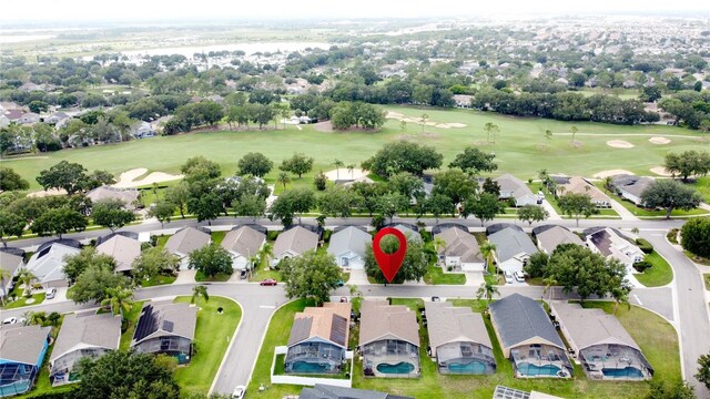 1364 Rebecca Dr, Haines City, FL 33844 - aerial perspective of suburban area with a golf course