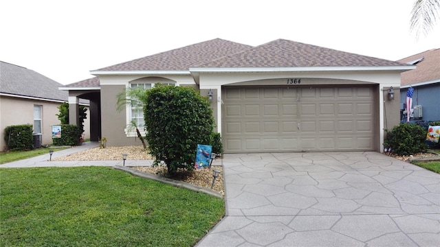 1364 Rebecca Dr, Haines City, FL 33844 - single story home with stucco siding, roof with shingles, an attached garage, and concrete driveway