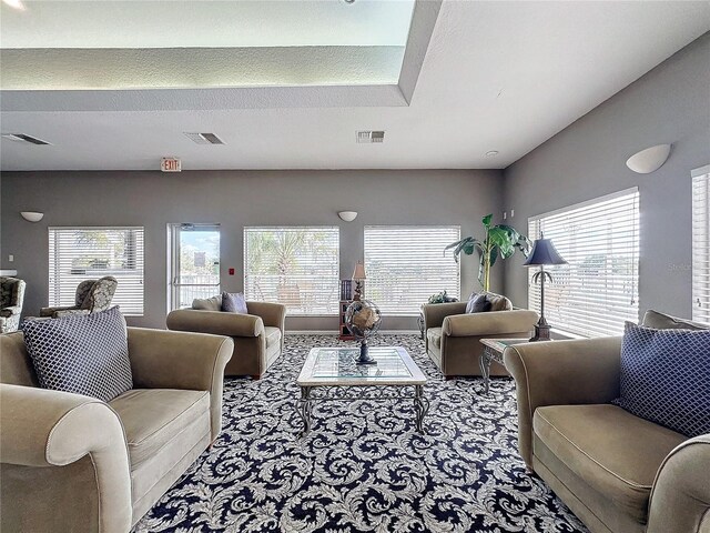 1364 Rebecca Dr, Haines City, FL 33844 - living area featuring carpet flooring and plenty of natural light