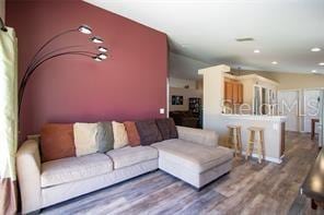 3030 Eagle Crossing Dr, Kissimmee, FL 34746 - living area with wood finished floors and recessed lighting