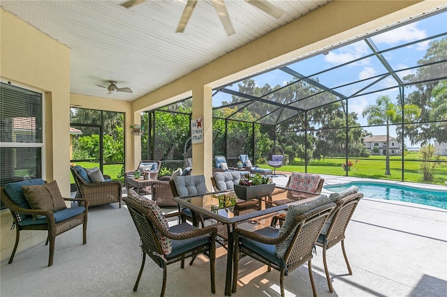 3427 Harborside Ct, Kissimmee, FL 34746 - view of patio / terrace with a ceiling fan, an outdoor pool, outdoor dining space, glass enclosure, and outdoor lounge area
