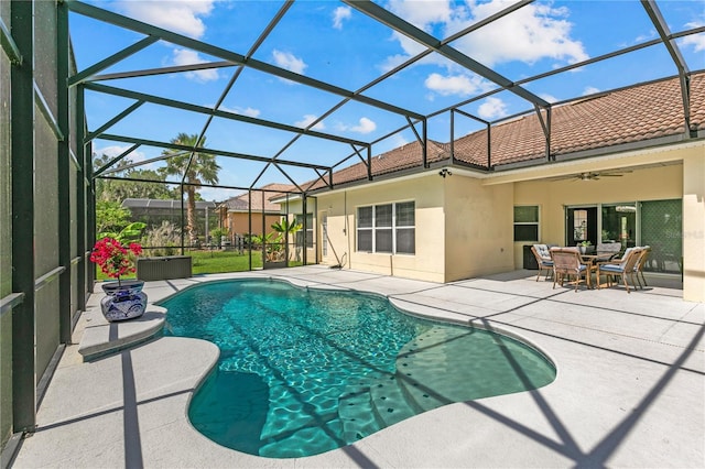 3427 Harborside Ct, Kissimmee, FL 34746 - swimming pool featuring a patio, ceiling fan, and a lanai