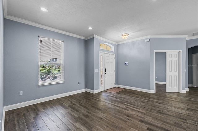 3427 Harborside Ct, Kissimmee, FL 34746 - entrance foyer with a textured ceiling, dark wood-type flooring, crown molding, and recessed lighting