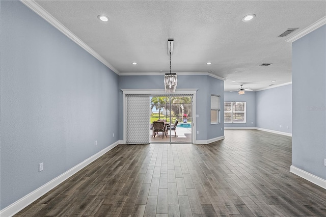 3427 Harborside Ct, Kissimmee, FL 34746 - unfurnished living room featuring ornamental molding, dark wood finished floors, a ceiling fan, a chandelier, and recessed lighting