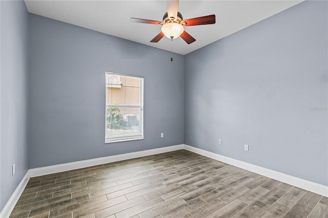 3427 Harborside Ct, Kissimmee, FL 34746 - empty room with wood finished floors and a ceiling fan