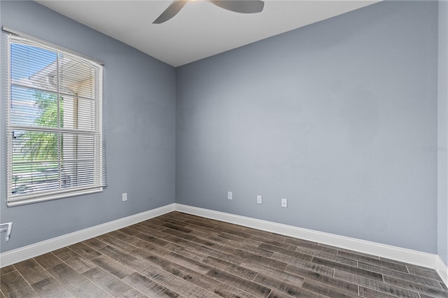 3427 Harborside Ct, Kissimmee, FL 34746 - spare room with wood finish floors and a ceiling fan