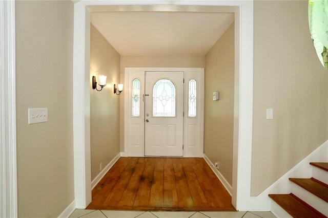 1843 Harbor Blvd, Kissimmee, FL 34744 - entrance foyer with wood finished floors and stairway
