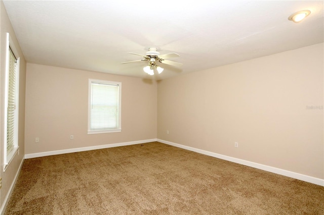 1843 Harbor Blvd, Kissimmee, FL 34744 - unfurnished room with carpet flooring and a ceiling fan
