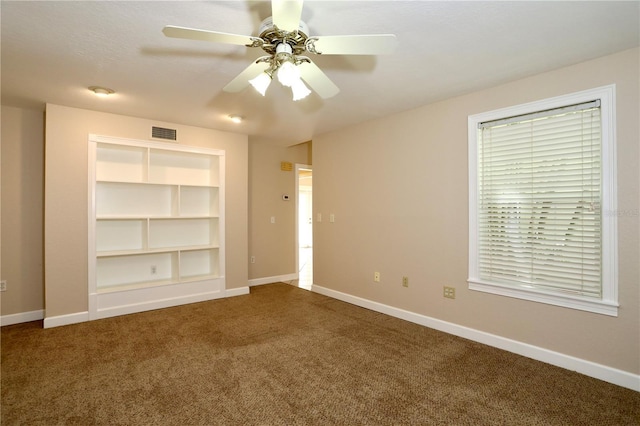 1843 Harbor Blvd, Kissimmee, FL 34744 - carpeted spare room featuring baseboards and ceiling fan